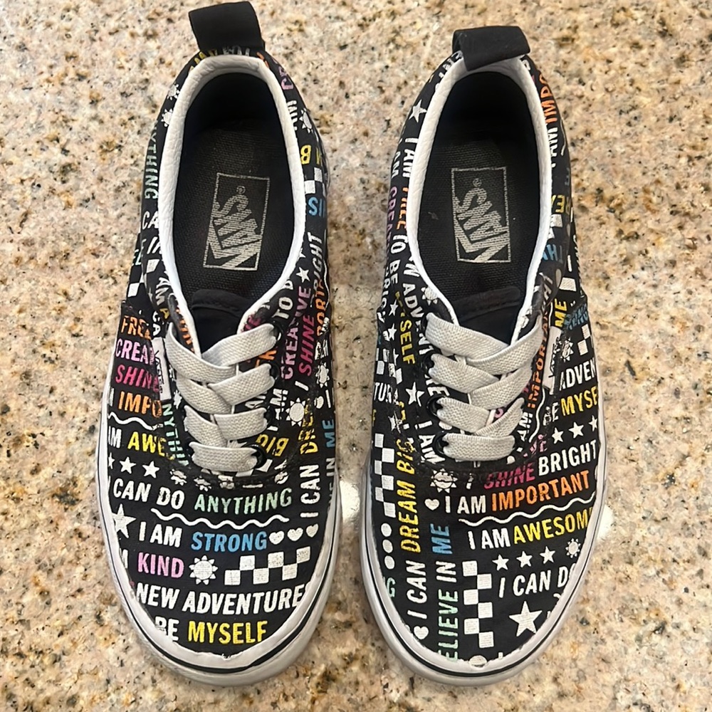 Girls vans with motivational words. Used a few times. Smoke and pet free home.